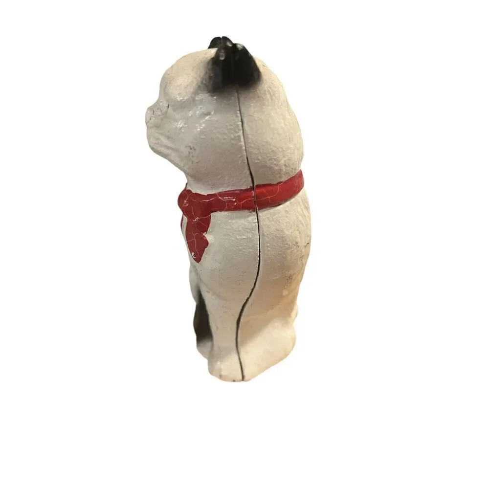 Retro cast iron cat with red bow penny bank by John Wright